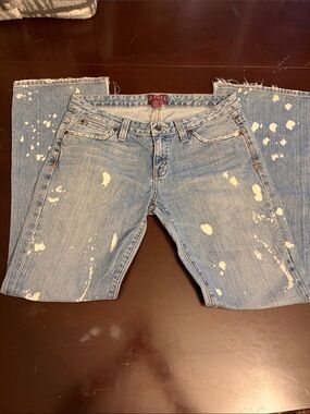 Distressed Light Blue Boot Cut Jeans - Women's